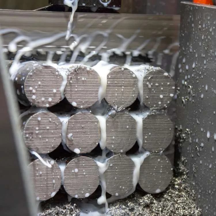 Metalworking coolant circulating through a sawing operation