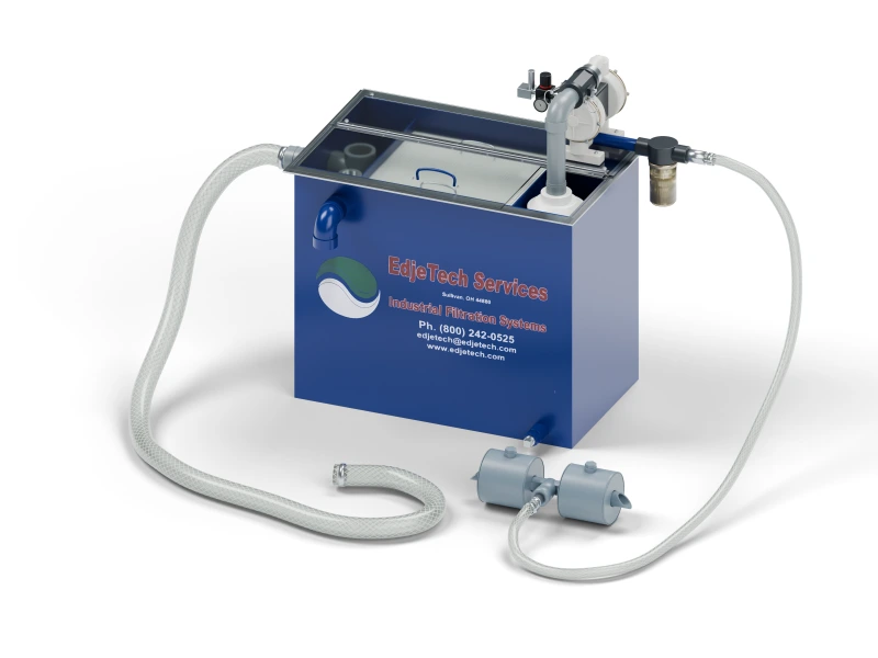 T.O.S.S. T1-AB tramp oil separator with clear cover, ballast skimmer, and connected hoses.