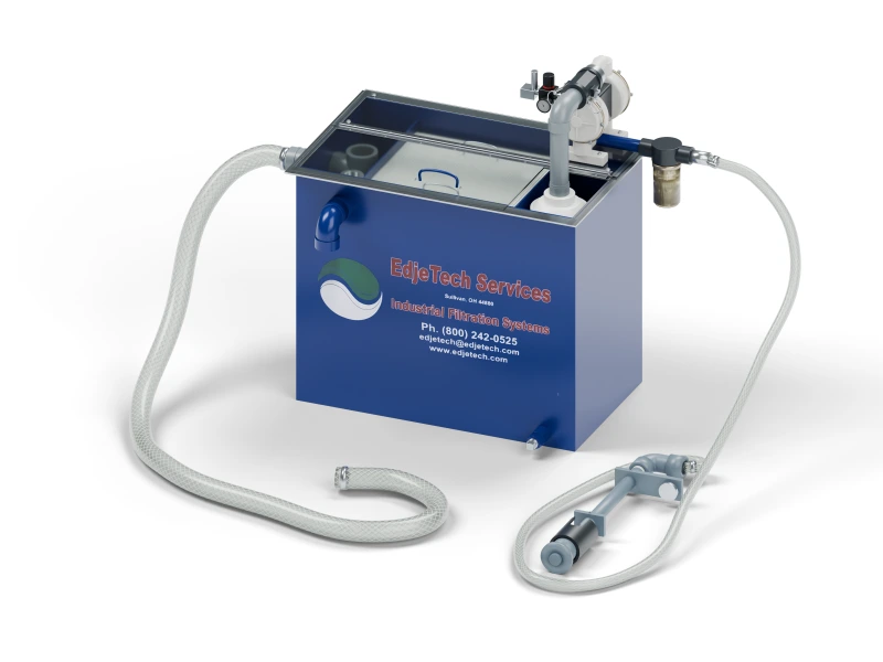 T.O.S.S. T1-AVH tramp oil separator with clear cover, vertical skimmer, and connected hoses.